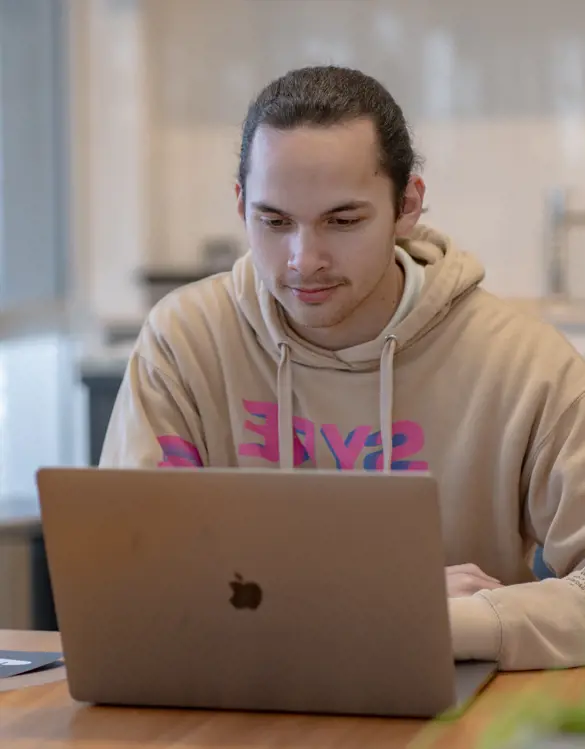 young man at laptop