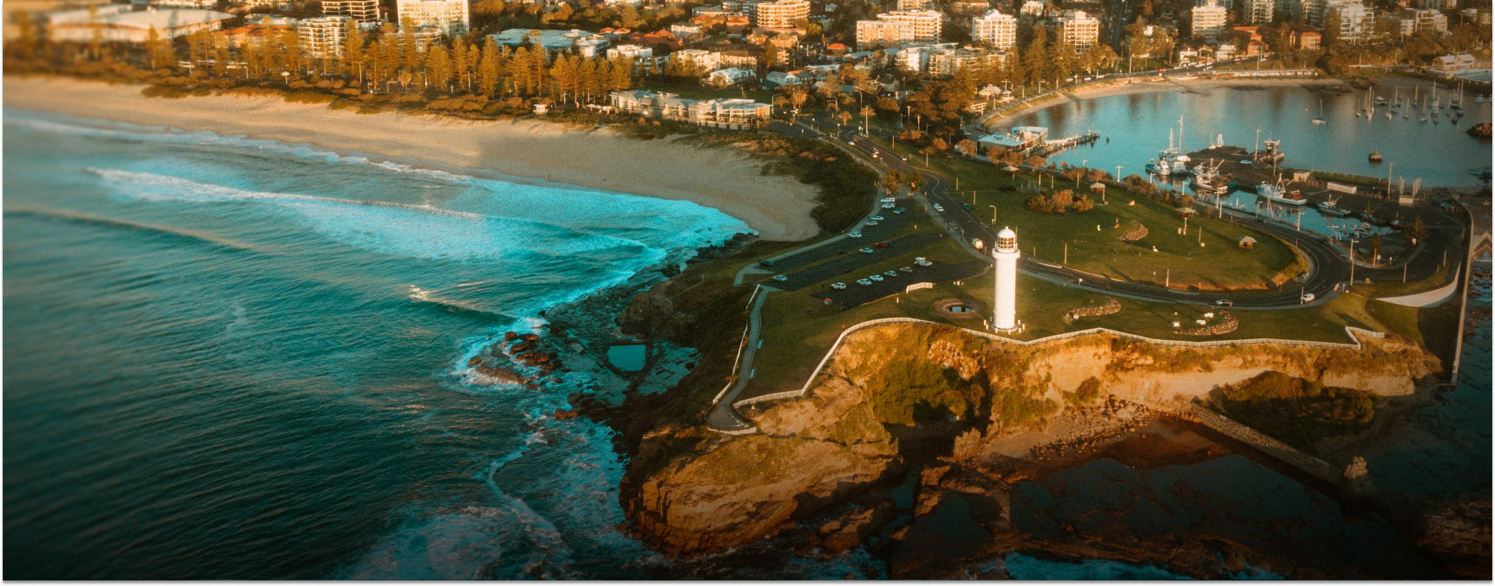 Wollongong, NSW: A breathtaking aerial view of a city coastline