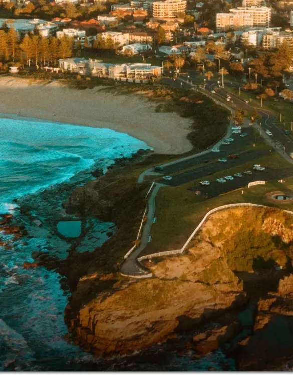 Wollongong, NSW: A breathtaking aerial view of a city coastline