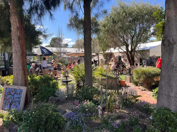 Gathering at the garden at The Well