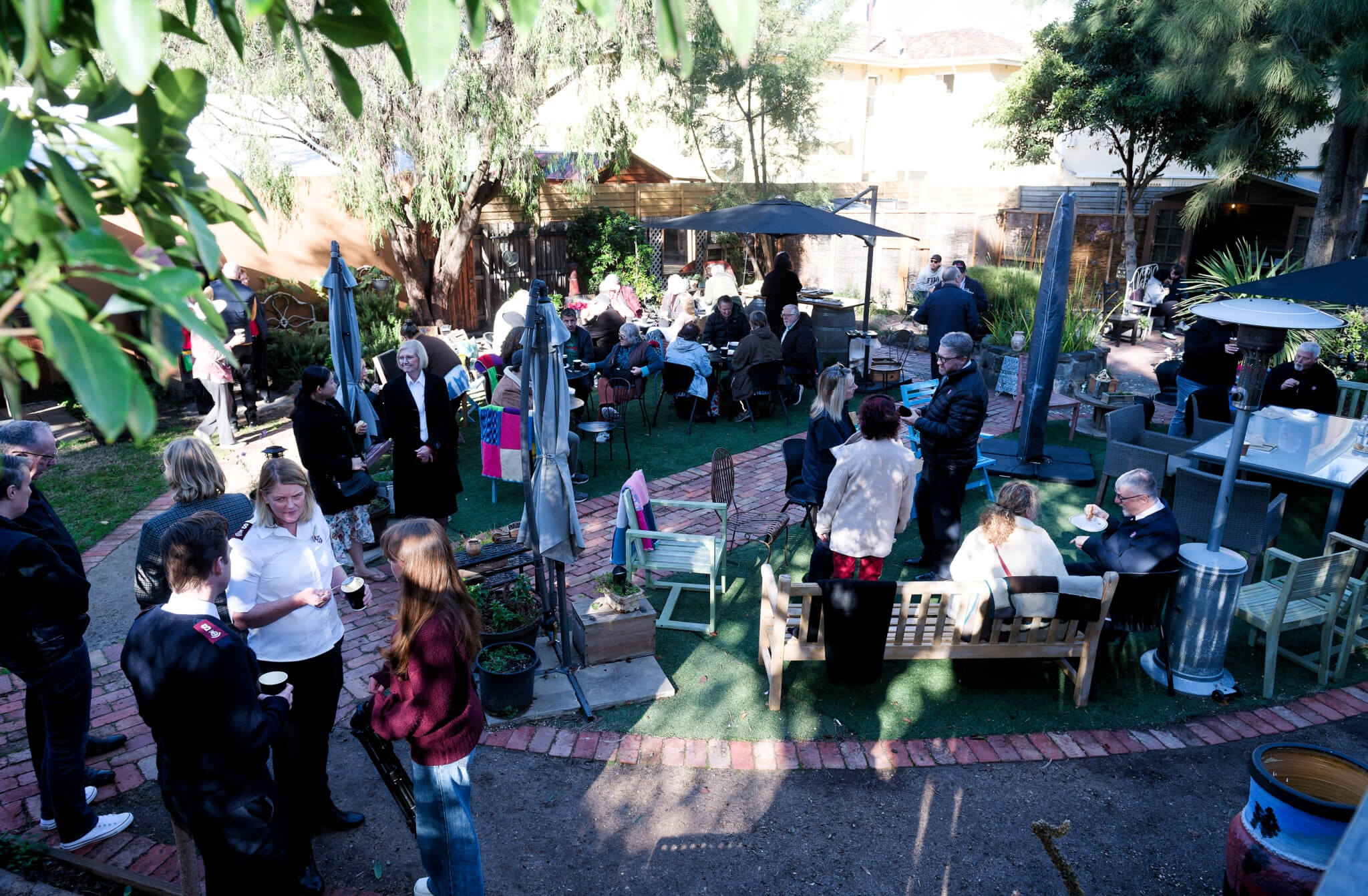 Gathering at the garden at The Well
