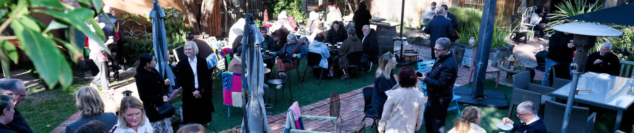 Gathering at the garden at The Well