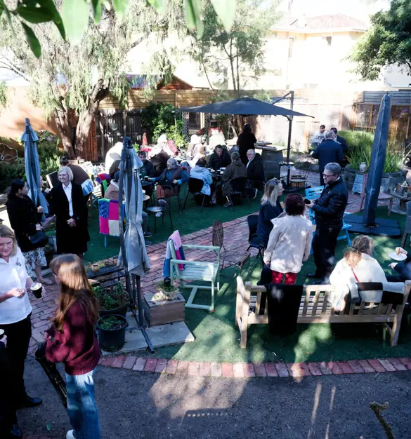 Gathering at the garden at The Well